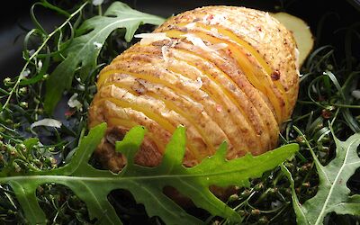 Hasselback potato with red chilli cheese