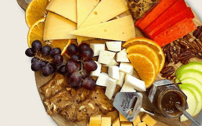 Delicious cheese board with various Henri Willig cheeses